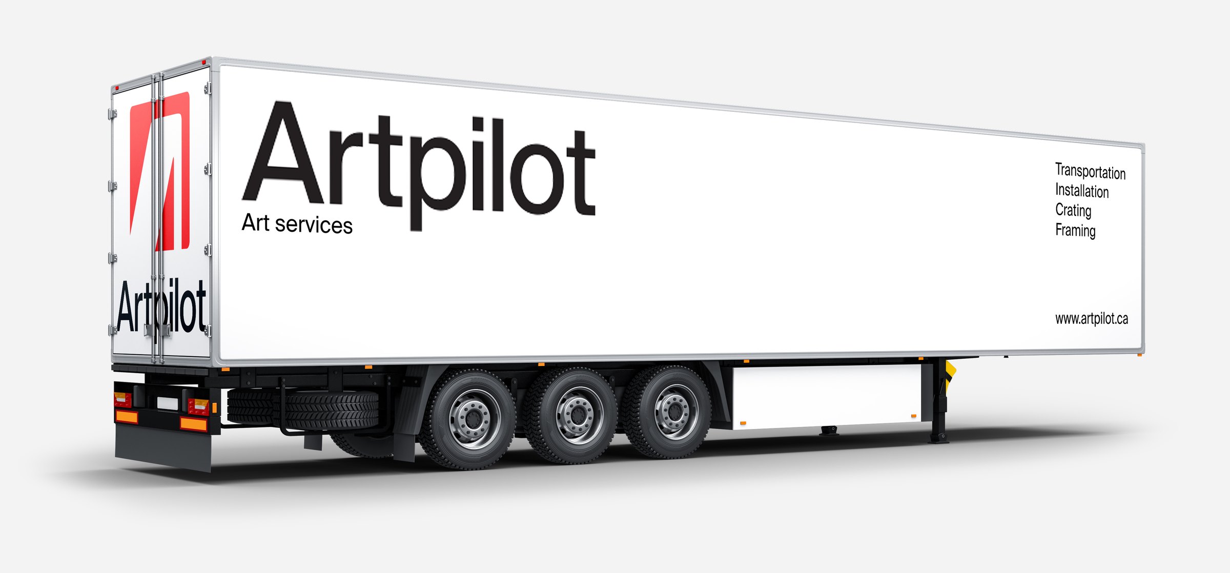 The Artpilot lockup on the side of a freight trailer, with the four services listed at the tail: transportation, installation, crating, framing